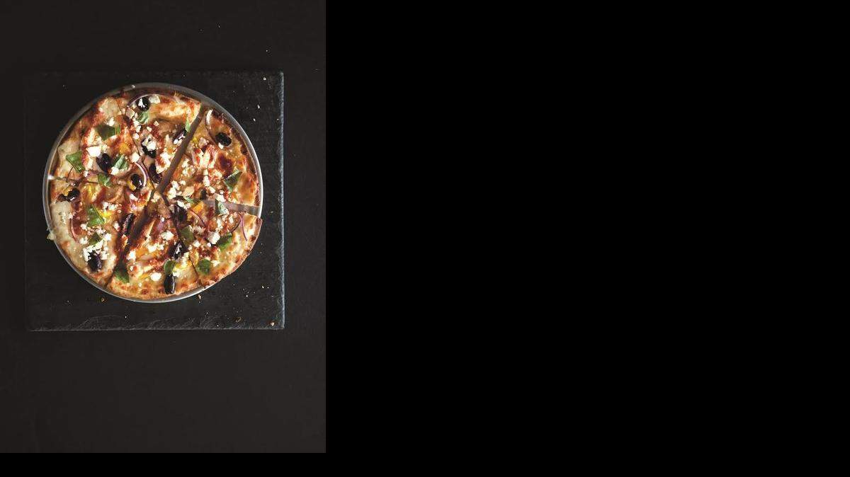 
Pie Five’s Athenian pizza on artisan thin crust.
