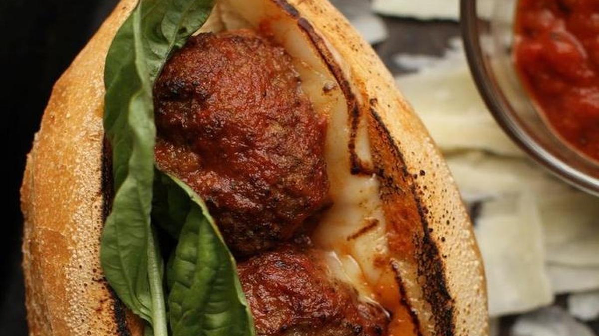 The Russell’s meatball sandwich (three Italian meatballs simmered in charred tomato sauce with provolone cheese, basil leaves on a grilled hoagie bun). The restaurant plans to open in early June at 3141 Main St.
