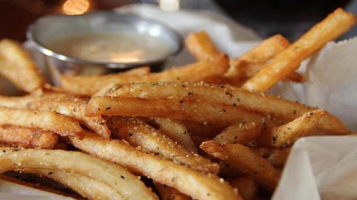 HopCat’s popular Crack Fries are beer-battered and sprinkled with its signature cracked black pepper seasoning.