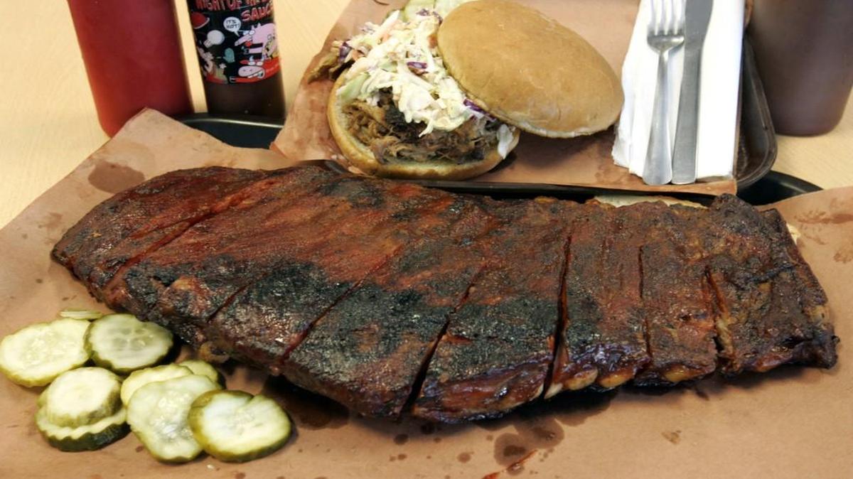 The slab of ribs and Carolina-style pulled pork sandwich at Joe's Kansas City Bar-B-Que, 3002 W. 47th Street.