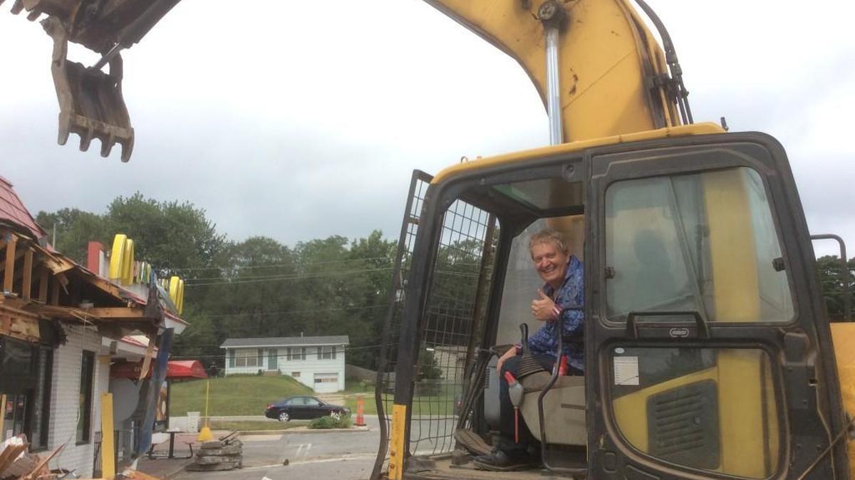 McDonald’s franchisee Jim Wagy took a quick lesson in operating an excavator and helped take down his location on N.E. Antioch on Friday. Wagy took over the restaurant in 2013 with plans to tear it down and build one of the latest McDonald’s designs.