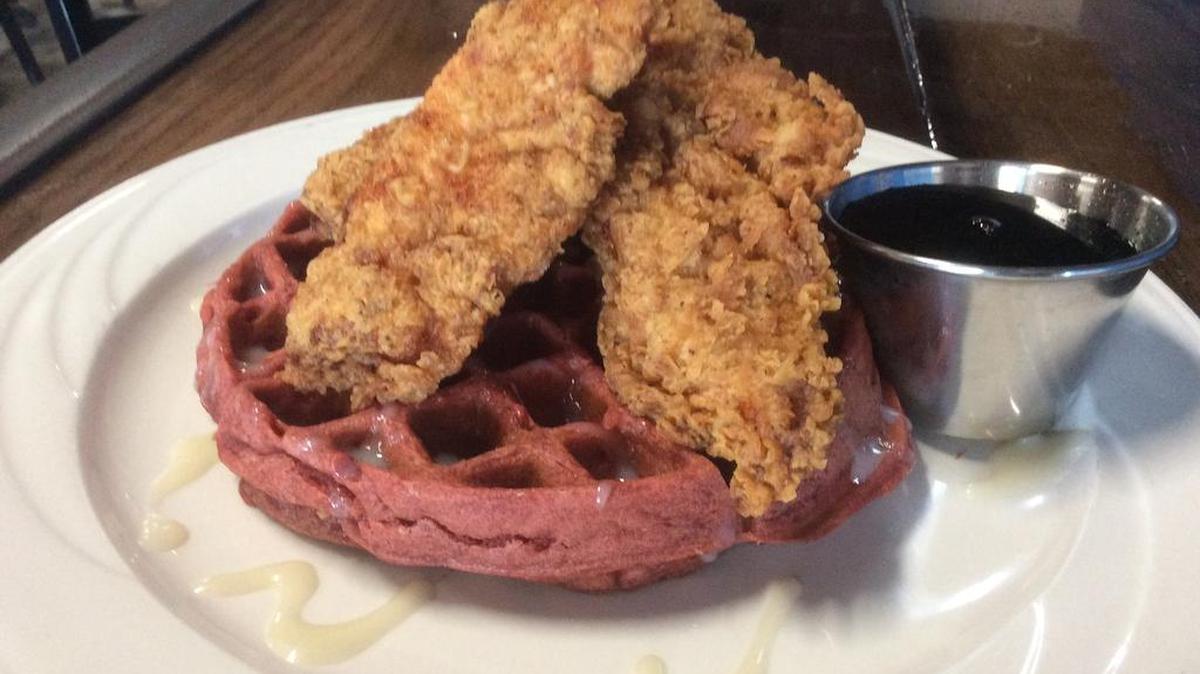 Crown Point Tavern’s chicken and waffles with vanilla butter.