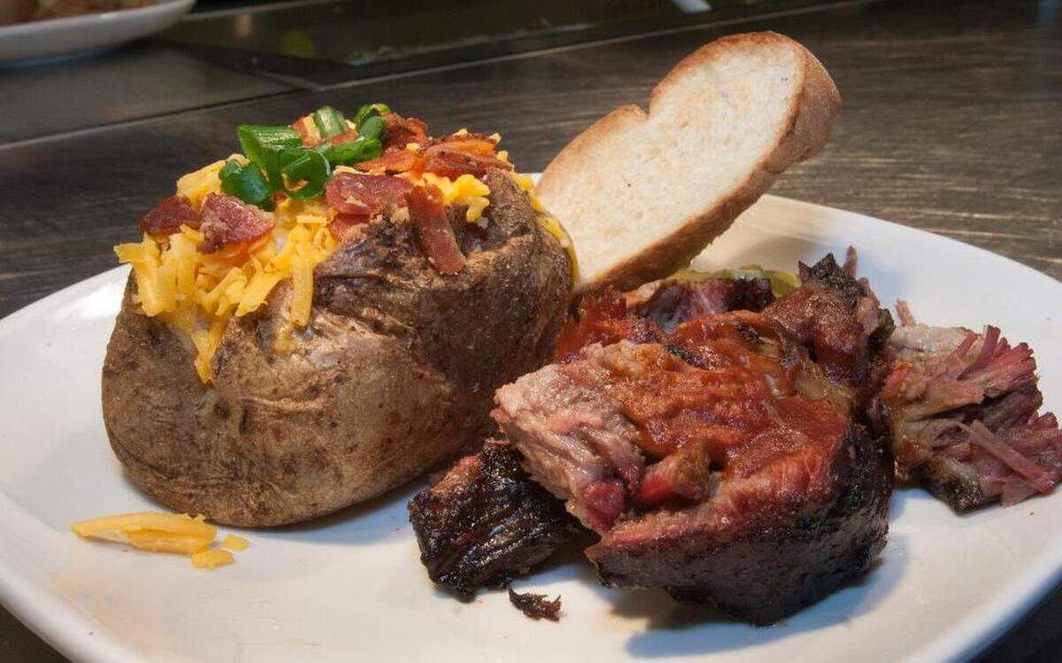 
A burnt end dinner was served during a practice opening Thursday at Fiorella’s Jack Stack Barbecue’s fifth and newest location in SummitWoods Crossing in Lee’s Summit. The restaurant opens Monday.
