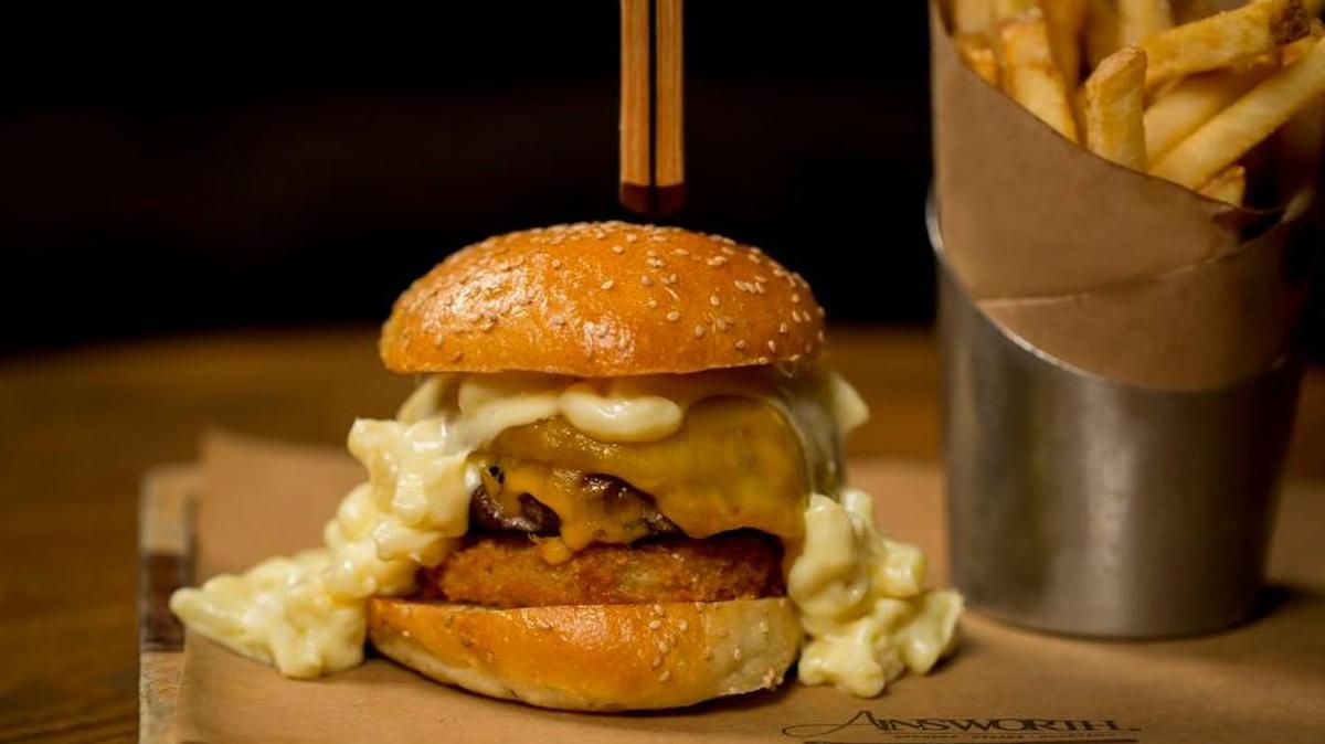 Ainsworth’s Mac & Cheese burger (panko crusted mac-n-cheese patty, beef patty and mac-n-cheese on a sesame bun.)