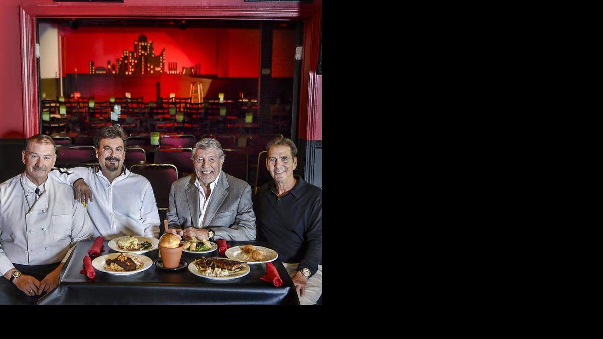 
Chef John Scott (from left), Craig Glazer, Stanford Glazer and Jeff Glazer are photographed on Tuesday, Oct. 7, in the restaurant at Stanford's Comedy Club, which has relocated from the Legends Outlets in Kansas City, Kan., to Rosana Square in Overland Park. The club has a new restaurant with a variety of dining choices including the famous flower pot bread made popular in their Westport restaurant Stanford & Sons.
