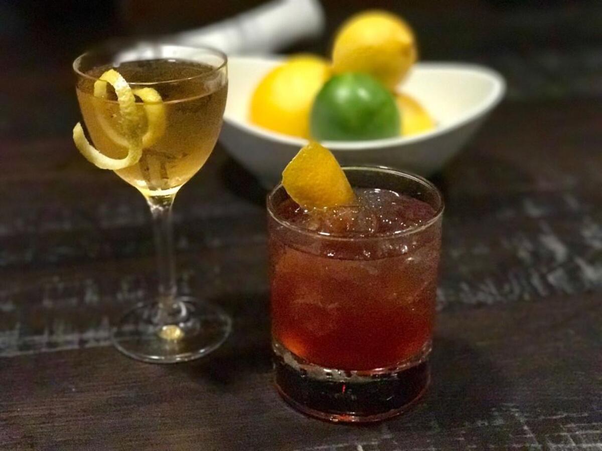 These eclipse-inspired cocktails, the Deep Space (right) and the Mercury Rising, cost $11 each at P.S. Speakeasy.