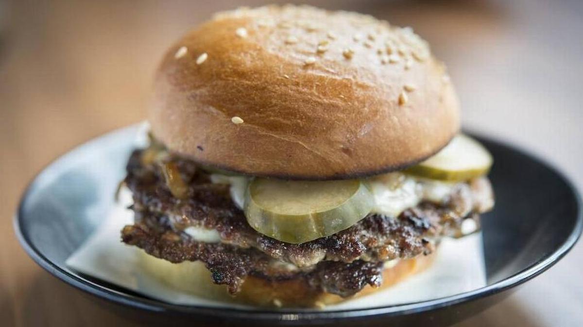 The cheeseburger on Corvino’s late night menu has aioli, charred onion, pickles and Muenster cheese.