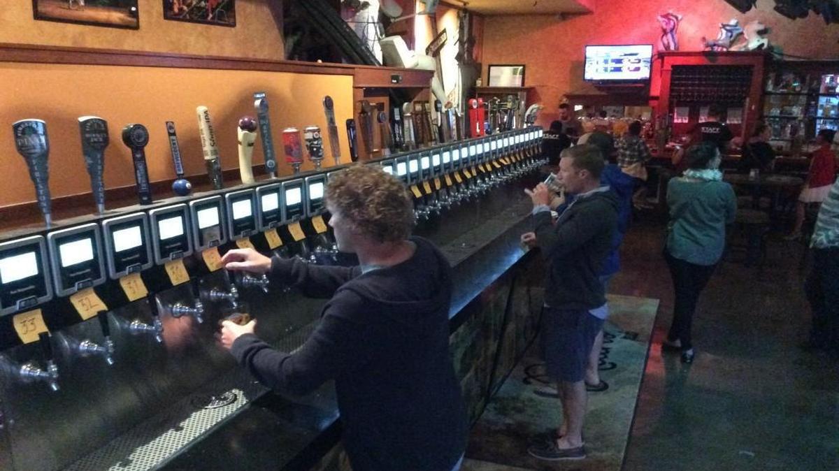 Ruins Pub’s customers can pour their own beers.