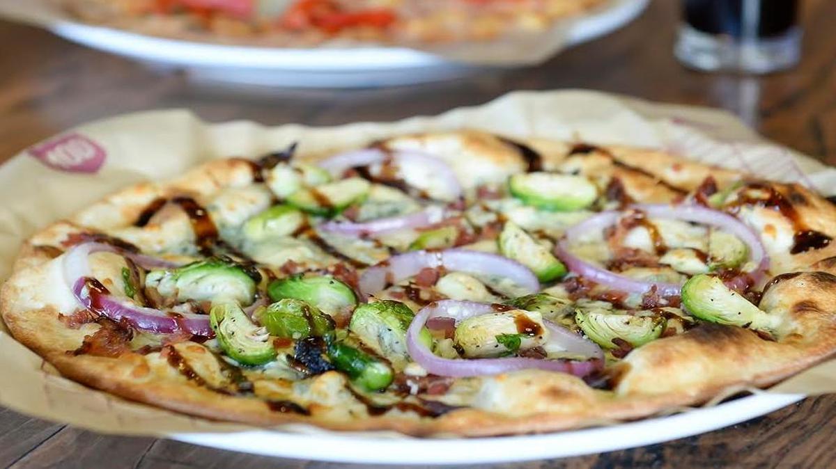MOD Pizza offers made-to-order individual artisan-style pizzas using fresh-pressed dough, its signature sauces and a choice of more than 30 toppings.