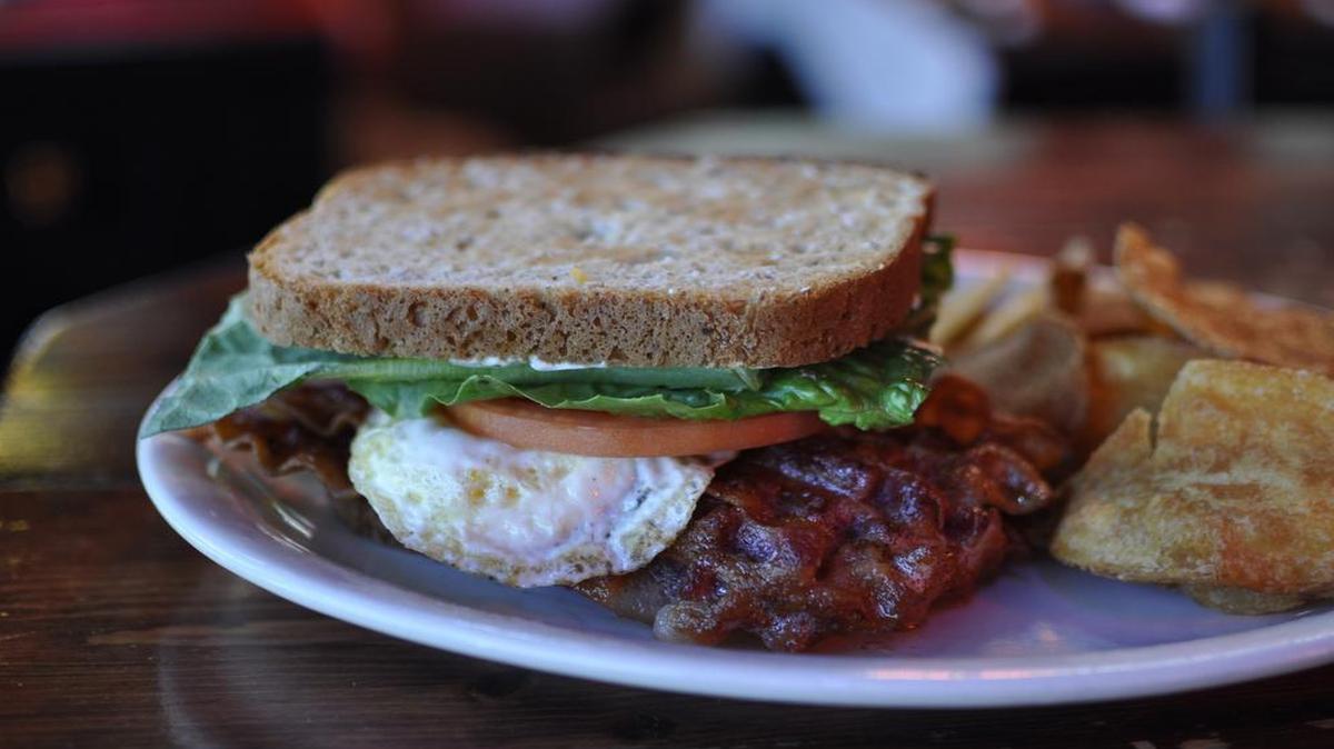 The Peanut’s BLT comes on toasted whole wheat bread with red onions and shredded cheese. This one includes an egg.