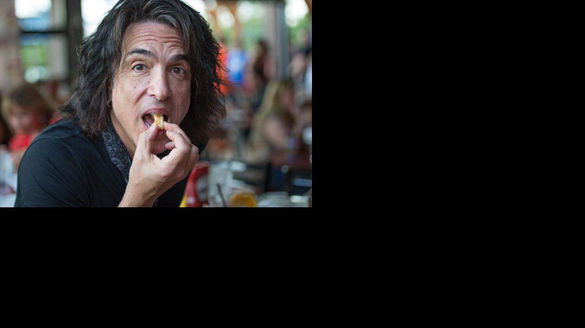 
KISS co-founder Paul Stanley sampled some of the food as he and Gene Simmons visited their new Rock & Brews restaurant in Prairiefire on Wednesday in Overland Park.
