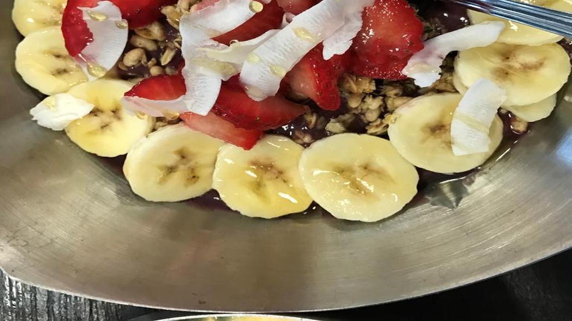 Vitality Bowls’ Tropical Bowl has a base blend of organic açaí, coconut milk, apple juice, bananas, mango, pineapple and flax seed. It is topped with organic granola, bananas, strawberries, coconut shavings and honey.