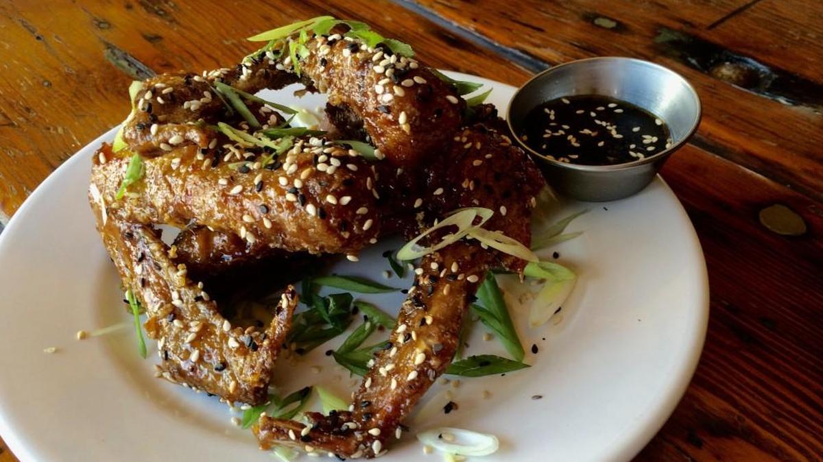Asian citrus-glazed duck wings with soy dipping sauce were on the bar menu at Black Dirt, the previous restaurant owned by Jonathan Justus and Camille Eklof.