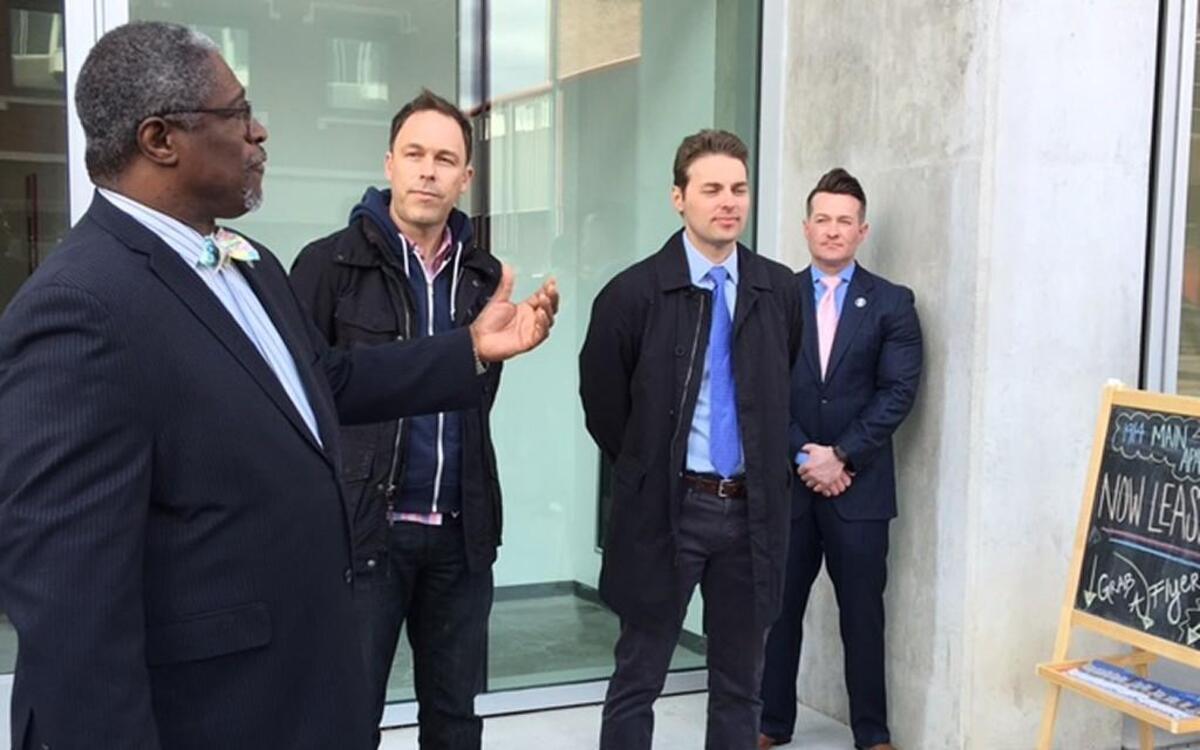 Mayor Sly James joined developers Scott Richardson and Andrew Ganahl on Tuesday to open their new apartment building at 1914 Main St.