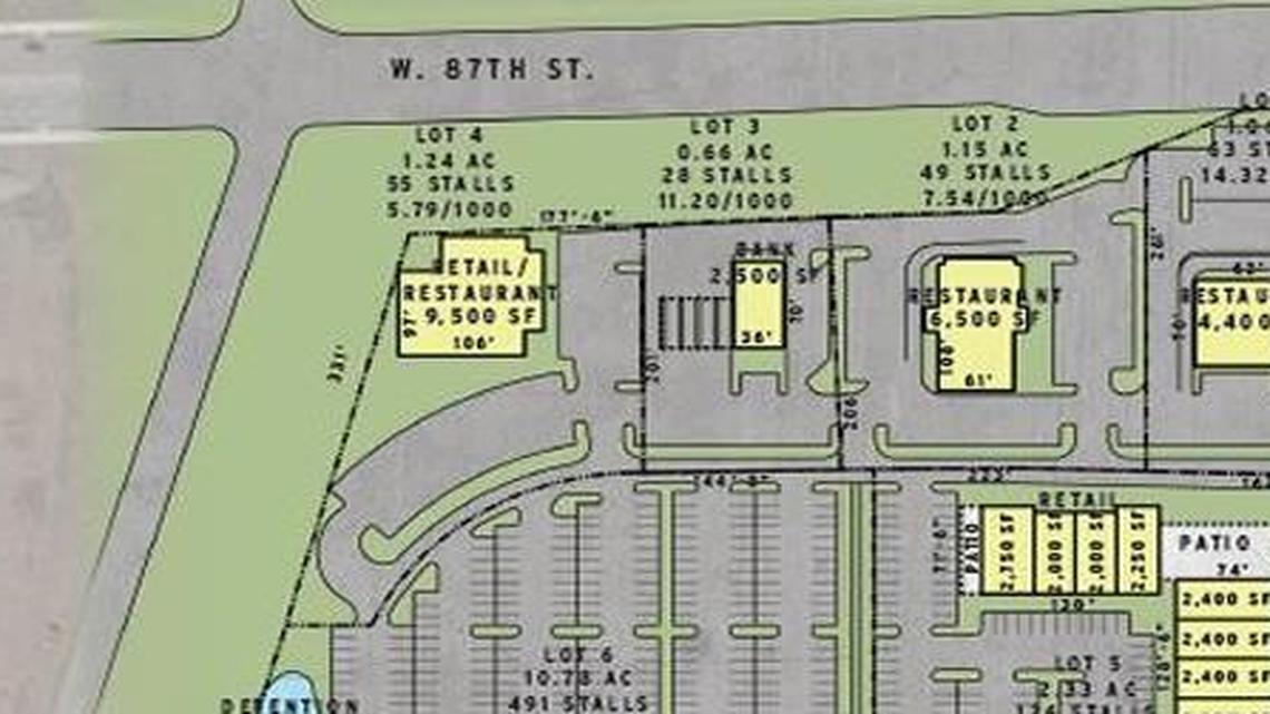 A site plan depicts a 85-acre mixed-use development in Lenexa