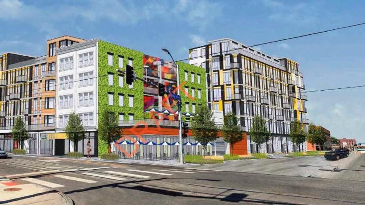 Looking northeast from 20th and Main streets, this rendering shows a proposed new restaurant on the former Hereford House site along with about 280 new apartment units facing Main, 20th, Walnut and 19th streets. The plan also includes renovation of the vacant Midwest Hotel into apartments.