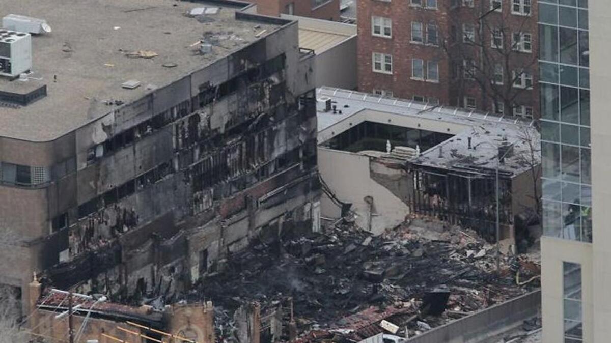 Aerial view of the damage caused by the 2013 fire at JJ’s restaurant on the Country Club Plaza. The building directly behind JJ’s to the left will come down and become apartments if plans are approved.