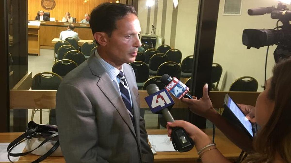 Cameron Group’s Tom Valenti, who is developing Mission Gateway, addresses media after the Mission Planning Commission approved his preliminary site plan on Monday.