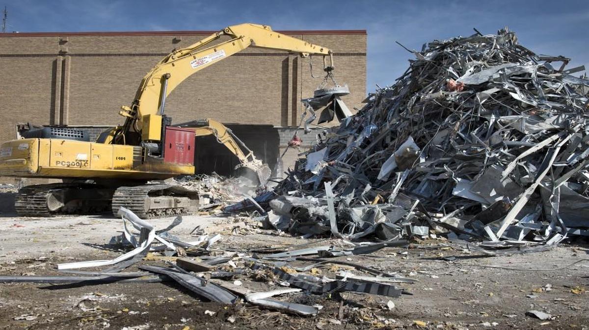 A plan to redevelop the former Indian Springs mall site in Kansas City, Kan., has stalled. In March 2016, workers from the Kaw Valley Companies were piling up metal for recycling at the site.