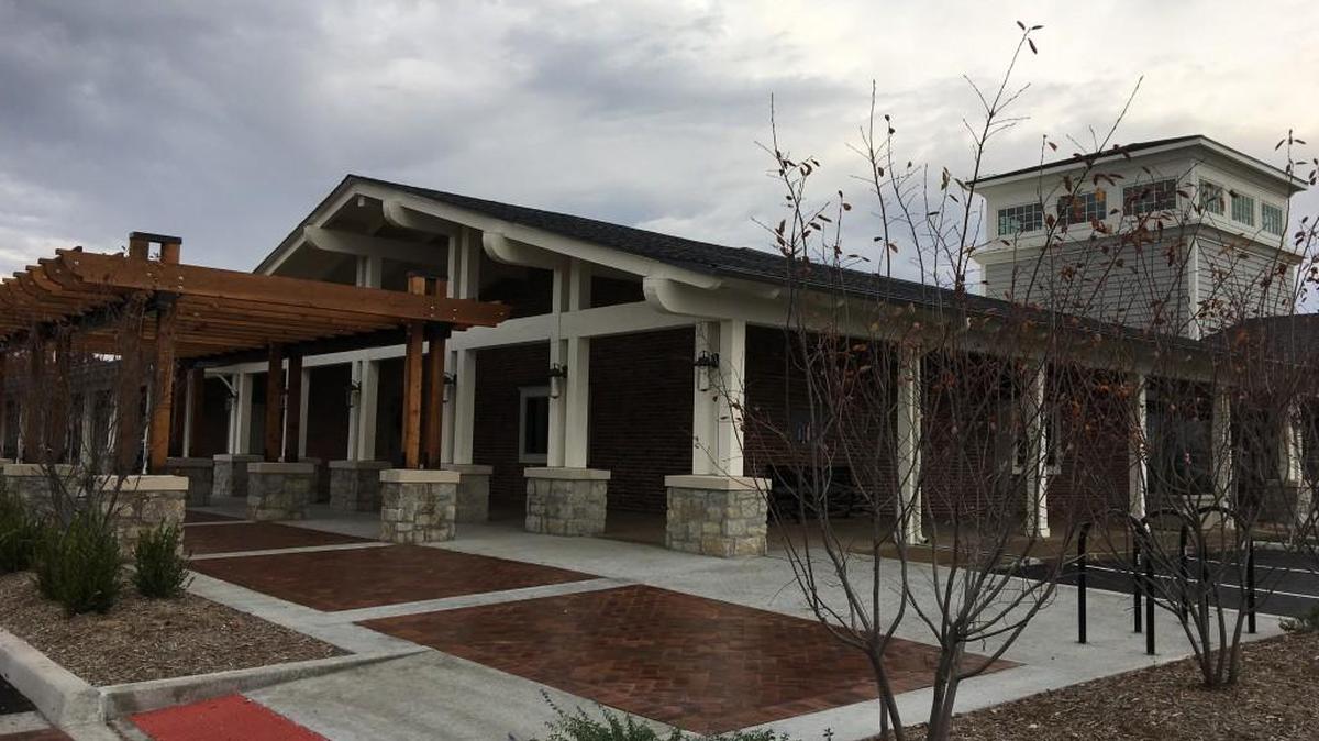 Outdoor dining space and new architectural towers are among renovations at the corners of Red Bridge Shopping Center in south Kansas City.