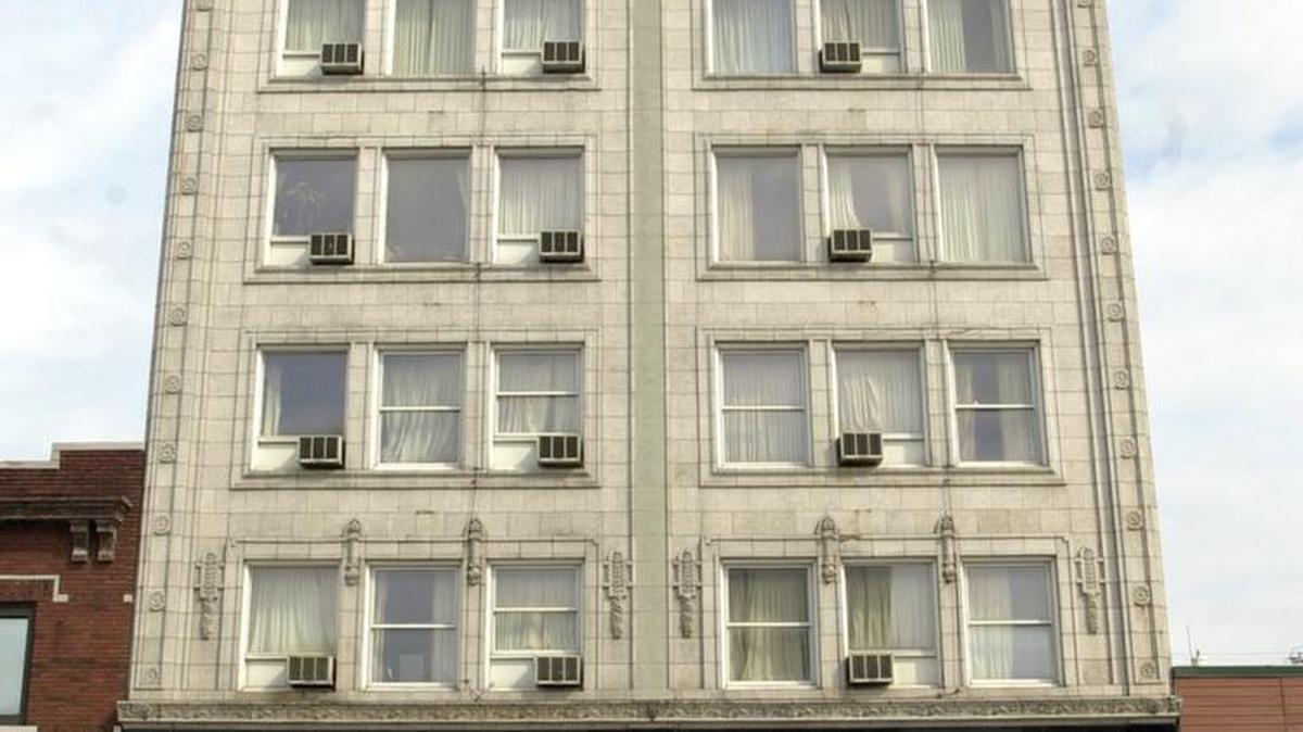A new development plan would save the Midwest Hotel building, 1925 Main St., and convert it into apartments.