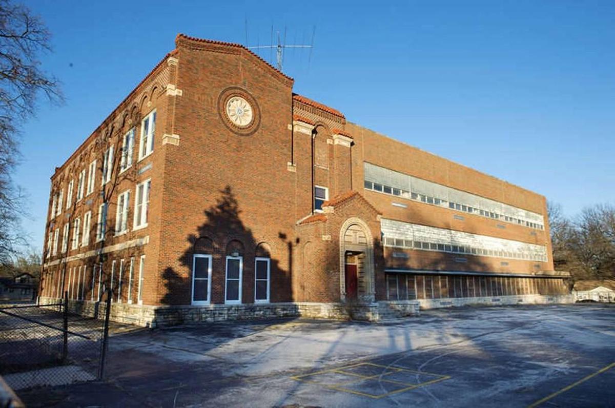 A development company envisions market-rate apartments in the former Marlborough Elementary School, 1300 E. 75th St.