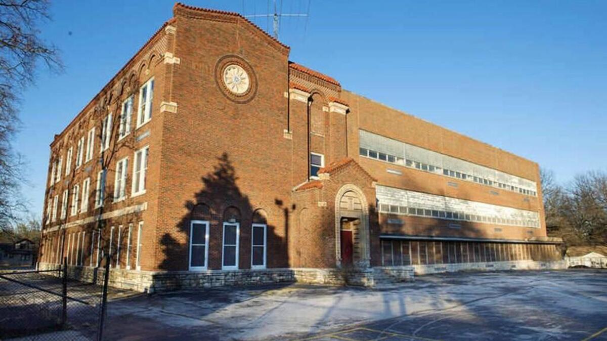 A development company envisions market-rate apartments in the former Marlborough Elementary School, 1300 E. 75th St.