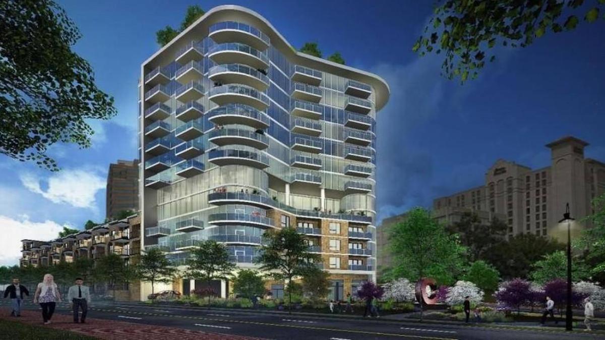 This architectural rendering, submitted to the Kansas City Council earlier this year, shows the 47 Madison apartment tower reaching 13 stories. The developer now wants to add two stories.