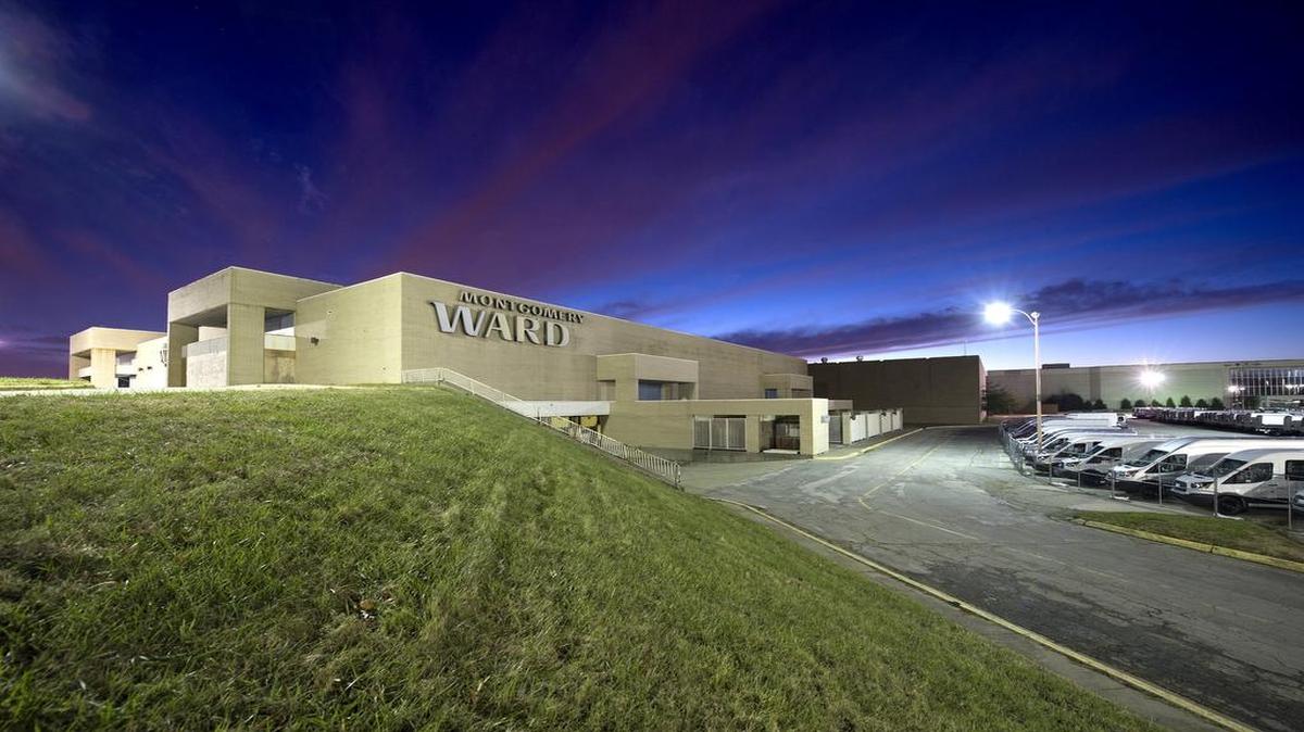 The mostly closed Metro North Mall at U.S. 169 and Barry Road is now a parking area for the Ford Claycomo plant. Macy’s is still open on the shopping center’s west side. A developer hopes to partially demolish the existing mall to create a much more open setting.