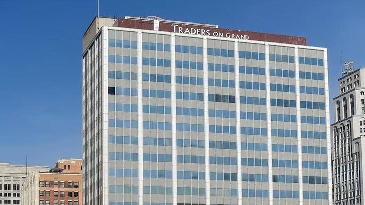 Sunflower Development Group’s plan to turn the Traders on Grand building downtown into apartment units was granted tax abatement.