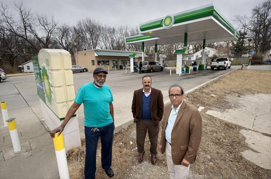 Ike Graham (from left), president of the Vineyard Neighborhood Association, has started working with service station owners Naeem Qaisar and Azam Mahfooz to address concerns about the station at 4501 Cleveland Ave.