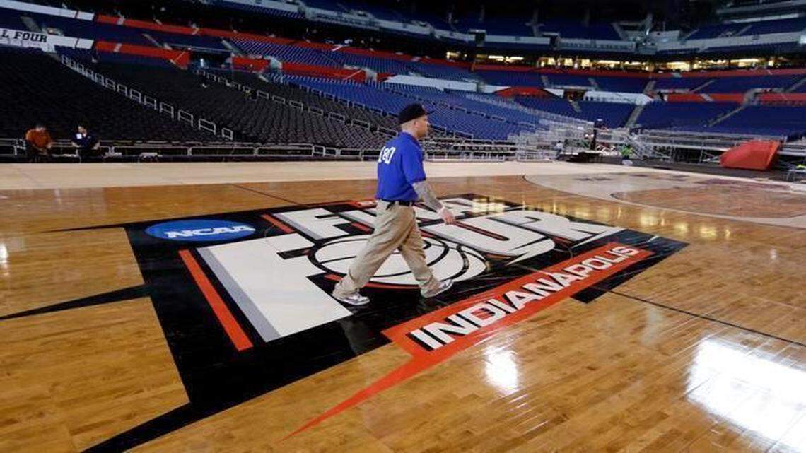 
A basketball court has been installed at Lucas Oil Stadium in Indianapolis to get the stadium, usually used for football, ready for the NCAA Final Four.
