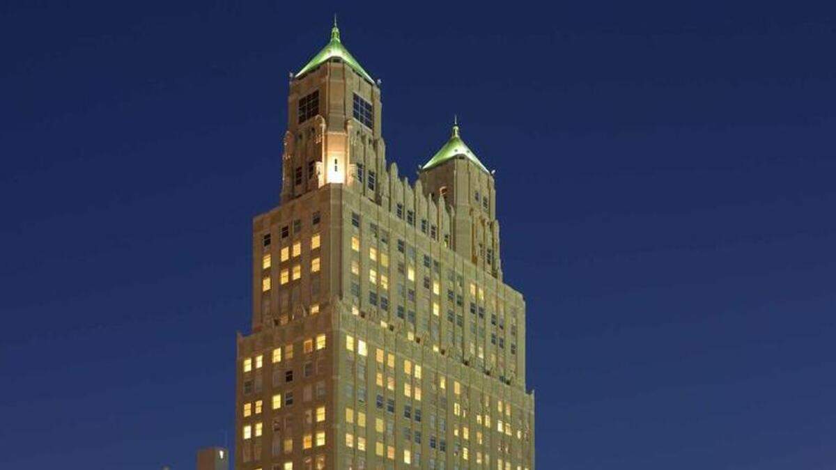 The 909 Walnut Building with its two distinctive towers.