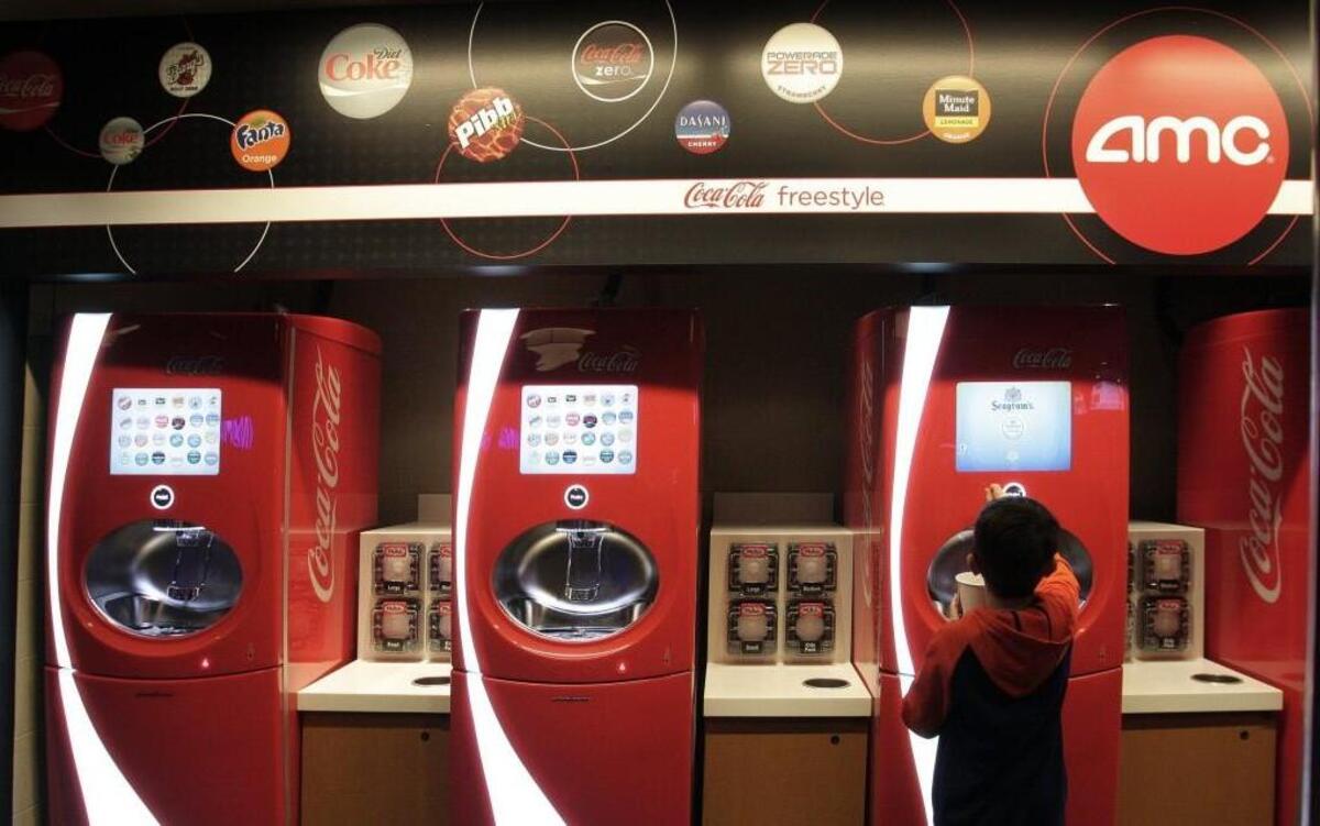 By the end of June, most of the Carmike Cinemas theaters that AMC Entertainment bought will be getting Coke Freestyle machines like these in the AMC 20 Theatres in Town Center Plaza in Leawood.