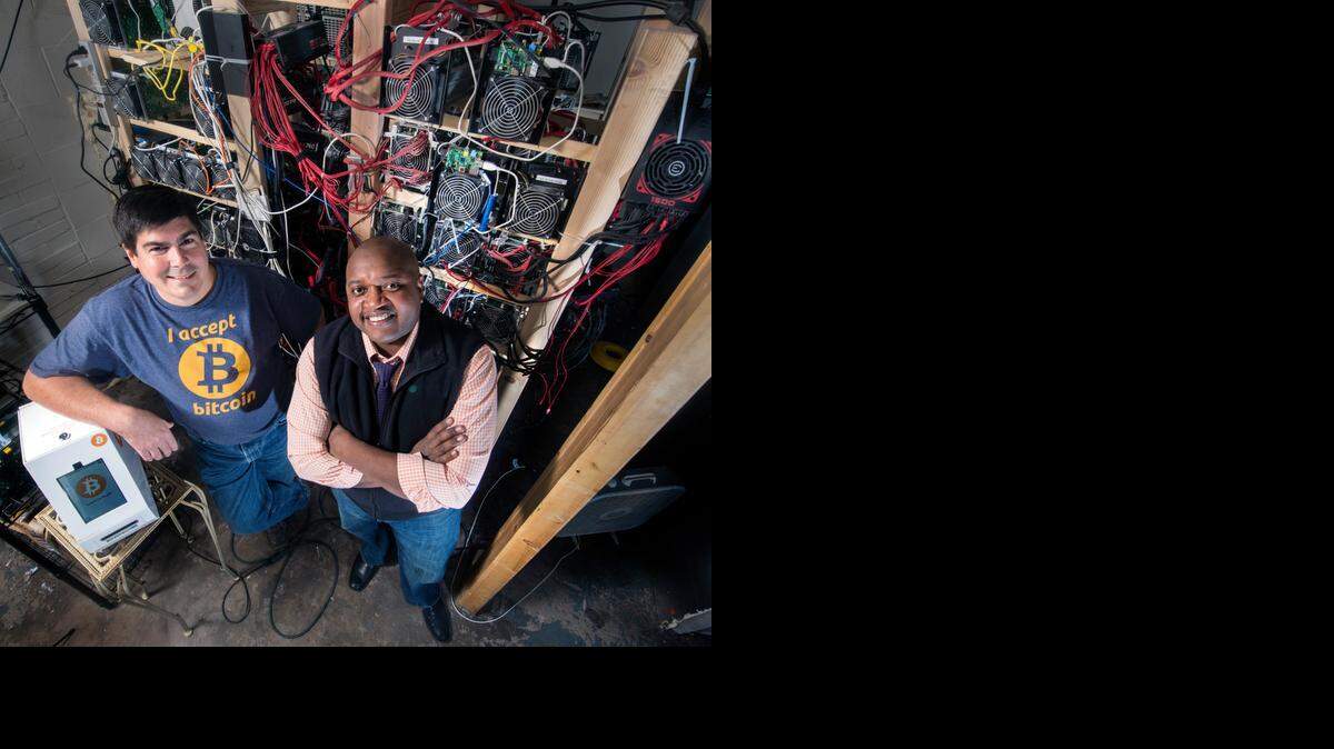 
Mark Vick (left) and Grant Brown have a bitcoin mining facility of their offices in Belton. Bitcoins are a virtual currency generated by computers decoding complex equations and used in some Internet shops to pay for goods and services or even traded for cash.
