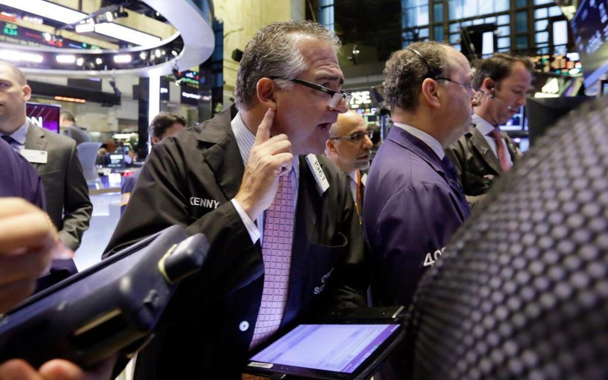 
Trader Kenneth Polcari (center) worked on the floor of the New York Stock Exchange.
