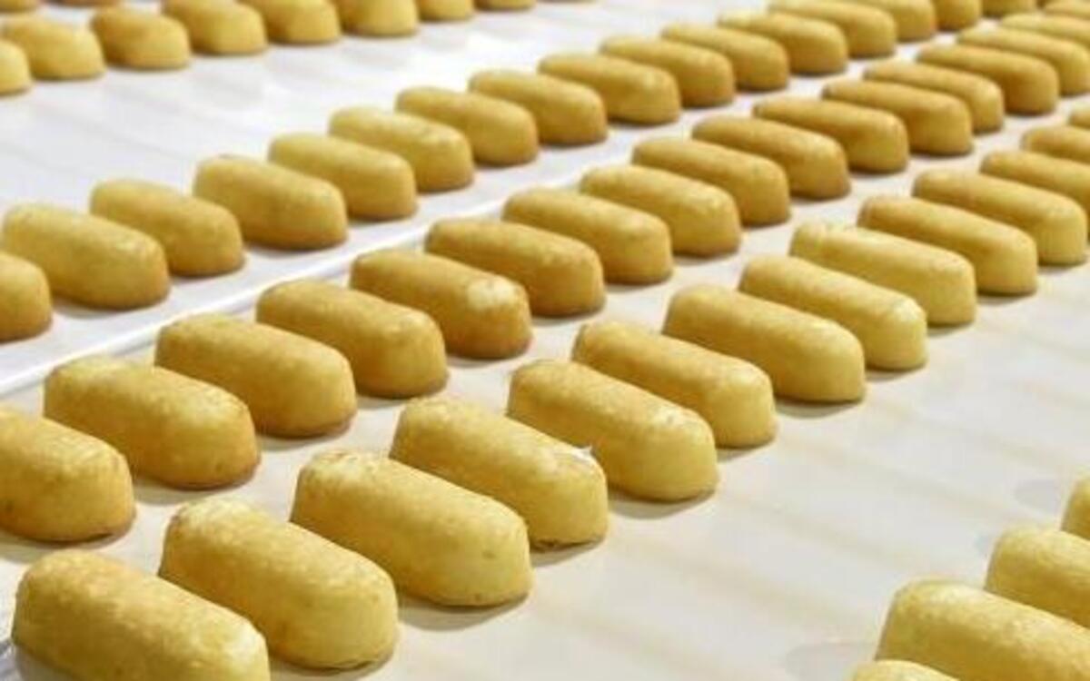 Bread is being baked in Lenexa again; snack cakes are rolling off the line in Emporia, Kan. Different companies have succeeded in the turnaround of the former Hostess operations that failed amid labor turmoil and bankruptcy. These freshly baked Twinkies travel down the conveyer belt to the packaging area at the Hostess Emporia plant.