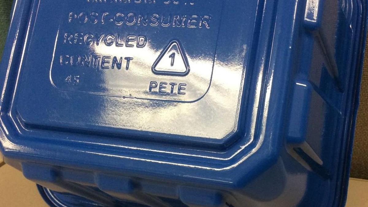 The universal recycling symbol — chasing arrows in the shape of a triangle.