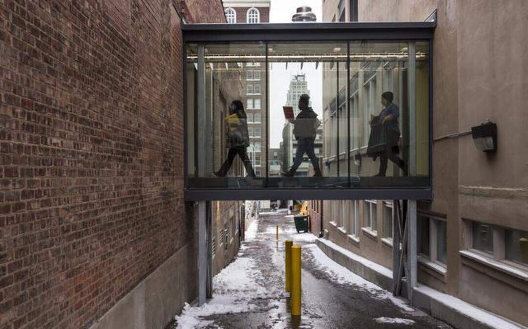 
A glass bridge connects two buildings in downtown Kansas City.
