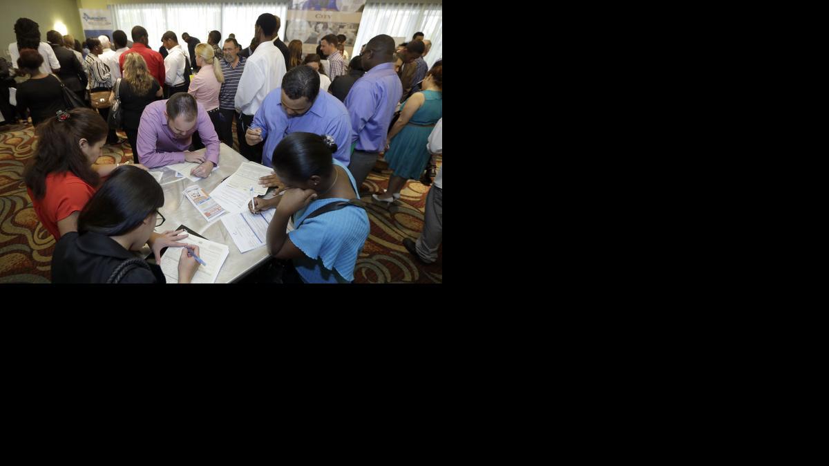 
Job seekers at a job fair in Miami Lakes, Fla. 
