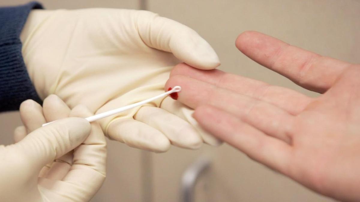 A patient receives an HIV antibody test at the Kansas City Care Clinic. The clinic is partnering with the Community Health Council of Wyandotte County on a new project to help 10,000 Wyandotte County residents improve their health care.