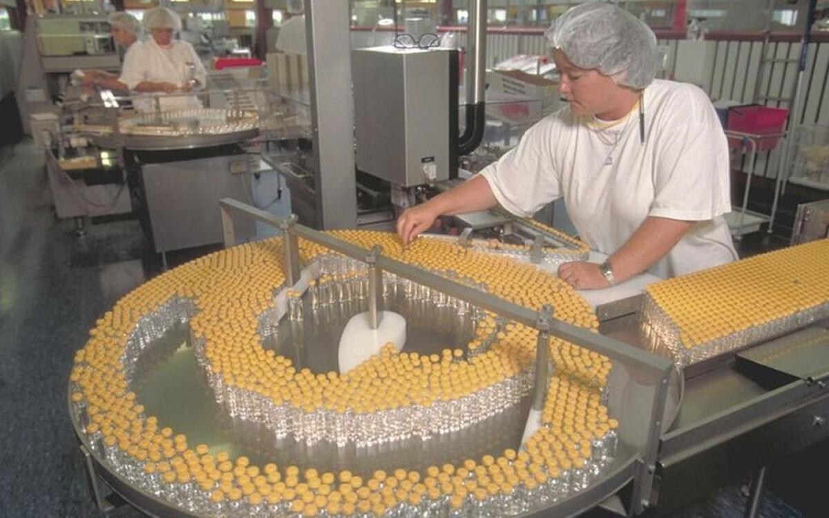 An unidentified worker checks vials of insulin at the Novo Nordisk factory in Kalundborg, Denmark. A Kansas City-based researcher led a study published this week that found that the company’s new long-acting insulin cut hypoglycemic diabetic emergencies by 40 percent.