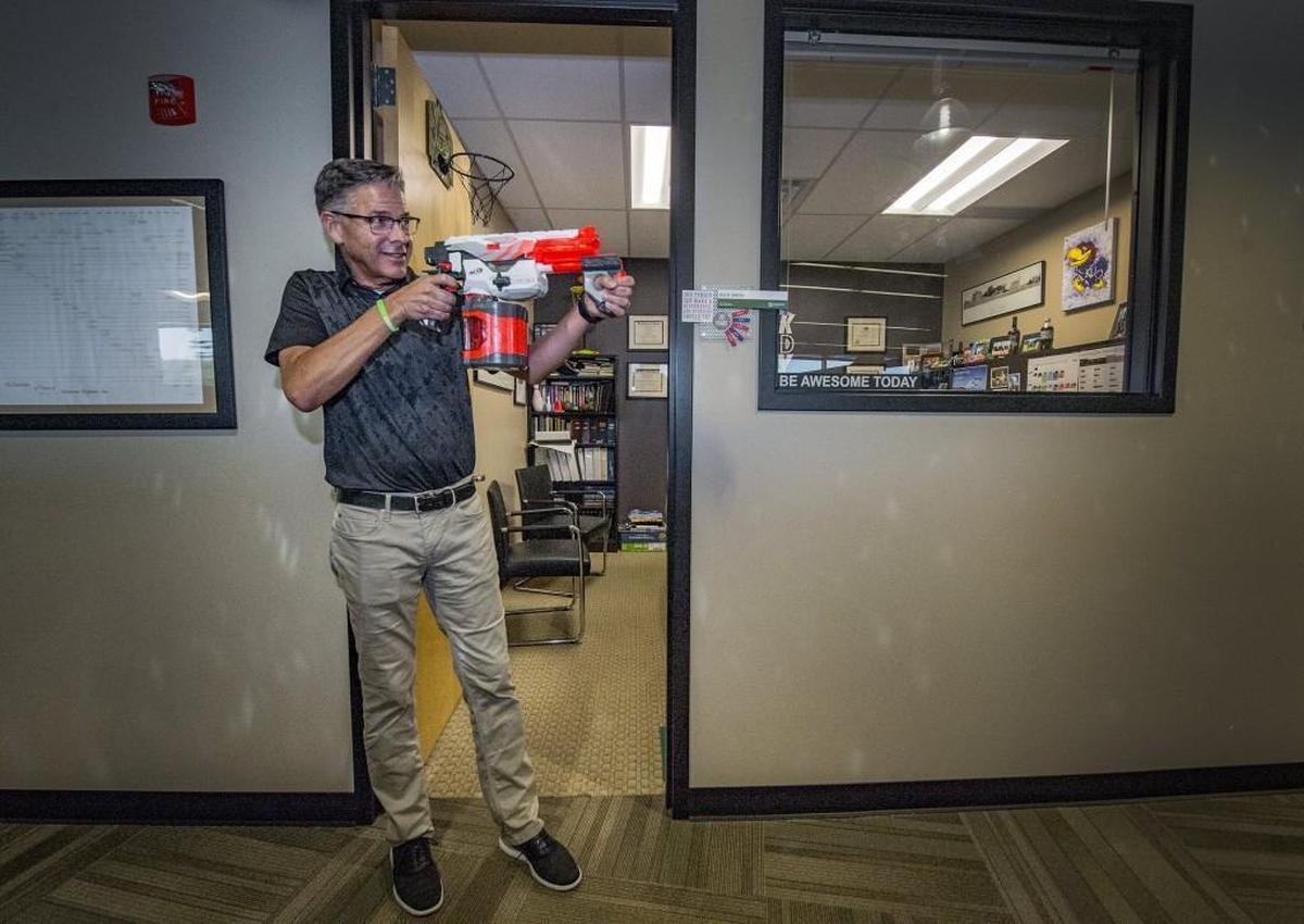 Henderson Engineers CEO Rich Smith follows his company’s “work hard, play hard” philosophy. “I have the most kick-ass Nerf gun in the history of the world,” he said during a recent tour of the engineering firm’s Lenexa office.