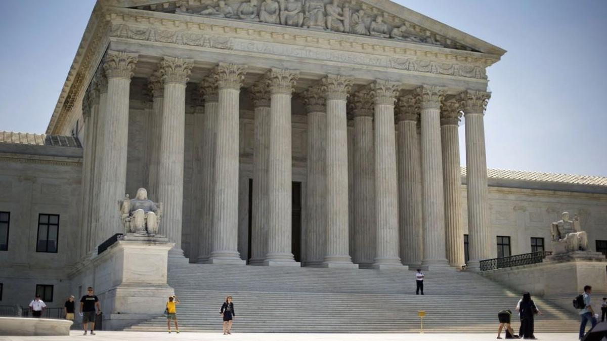 In a one sentence ruling Tuesday, the eight justices said they were evenly split on a case that started in Raymore. The split leaves intact a lower court decision against the spouses of two Missouri developers.