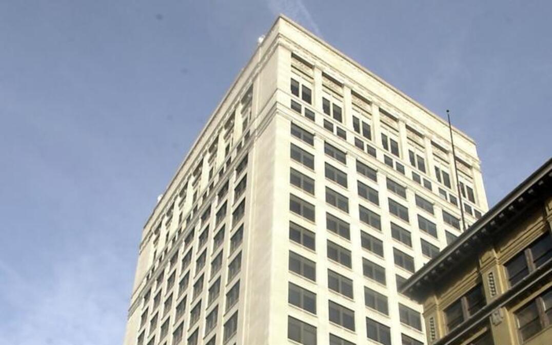 The Grand Reserve TIF plan would assist conversion of the vacant 21-story tower at 925 Grand Blvd. to an Embassy Suites hotel.