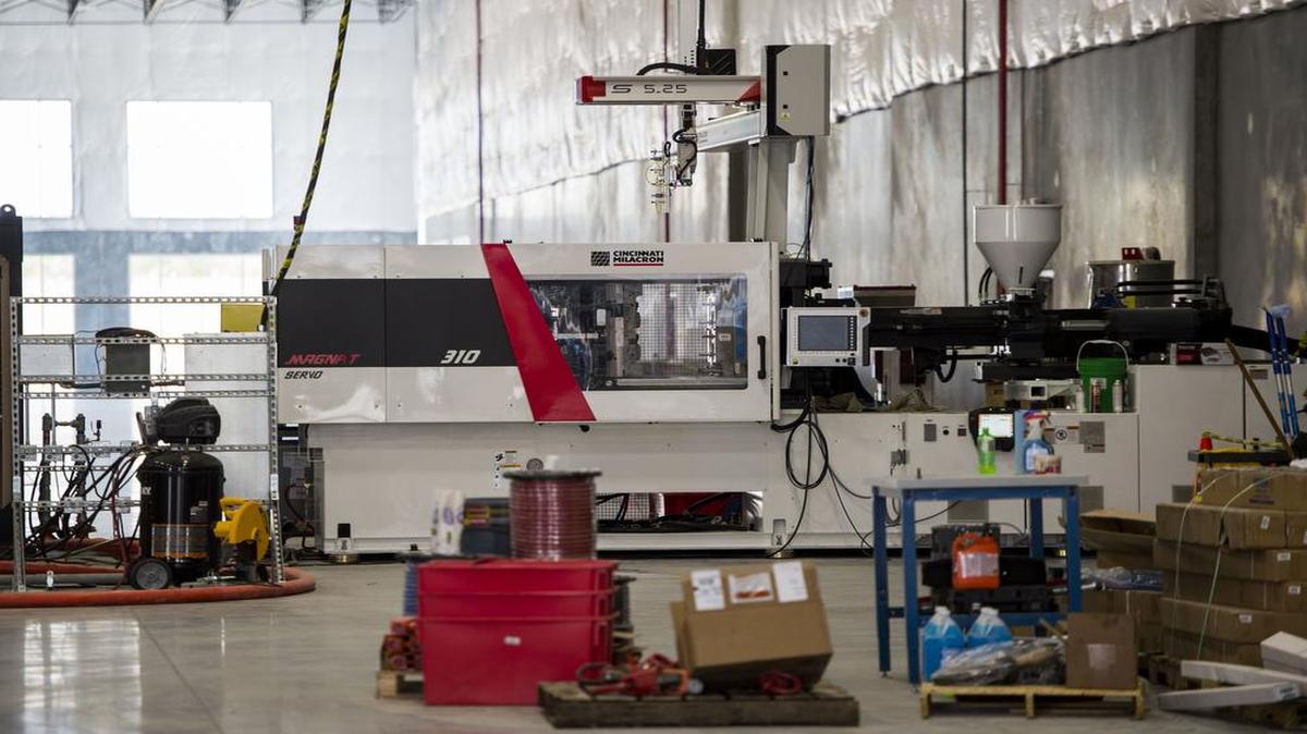 
One of several machines were in the process of being installed after Tuesday’s announcement of U.S. Farathane opening a new automotive supply plant in Riverside.
