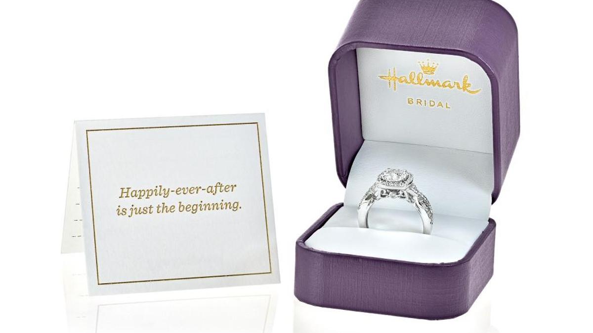 The Heart of Hallmark engagement rings are packaged with a small card to commemorate the who, when and where of the proposal.