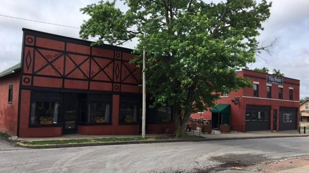A rezoning request to develop the building next door to The Point, a bar at 44th Street and Belleview Avenue, has ramped up conflict between the bar and Country Club Bank, its neighbor across 44th Street.