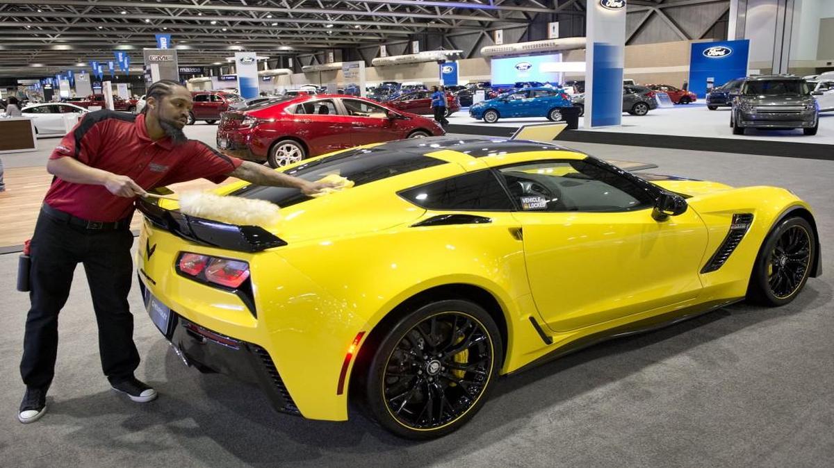 Professional detailer Moe Shannon dusted a Corvette Coupe during last year’s Greater Kansas City International Auto Show at Bartle Hall.