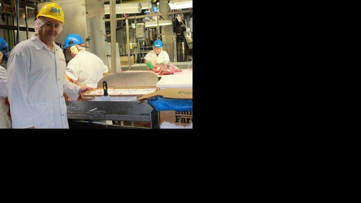 
Todd Scherbing is Smithfield Foods’ senior director of rendering and recently was on a hog-processing line in the Farmland Foods plant in Milan, Mo. 



